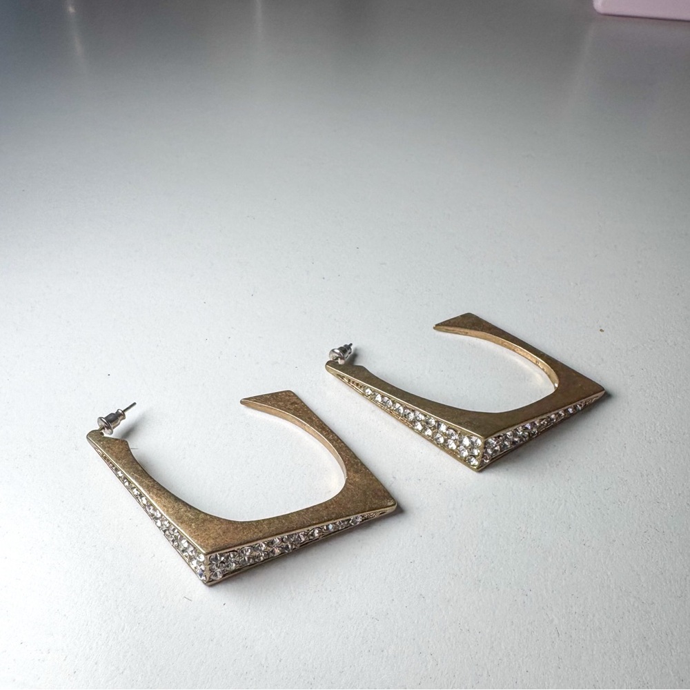 Gold earrings with rhinestones